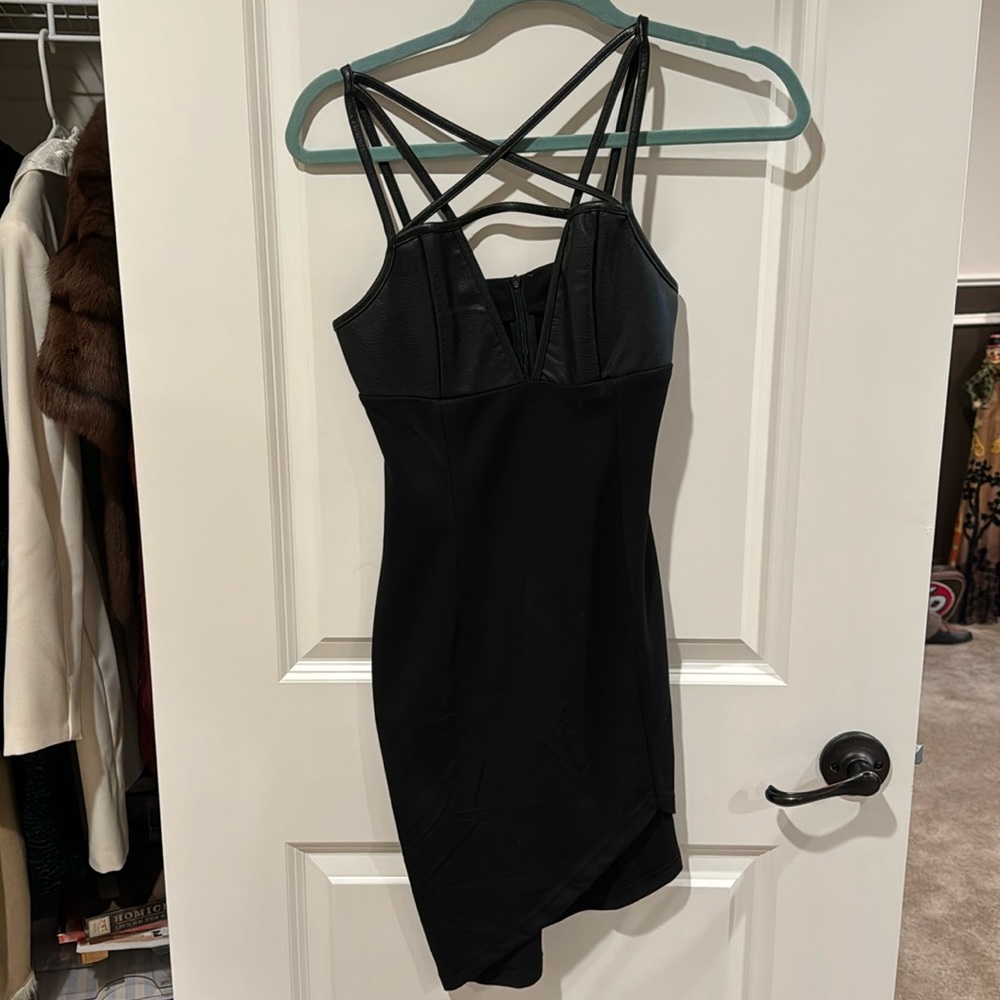 Black asymmetrical dress with faux leather top accent